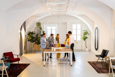 Group of business people working in office.